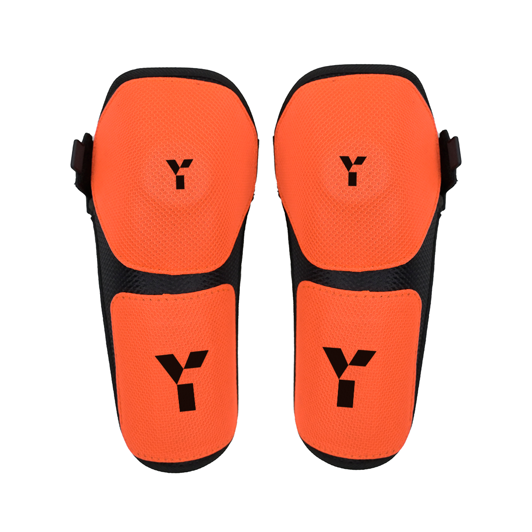 Young Ones | Young Ones PCD Knee Protectors | PCD Knee Protectors - Black/Orange | Total Hockey
